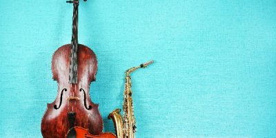 musical instraments on teal wall